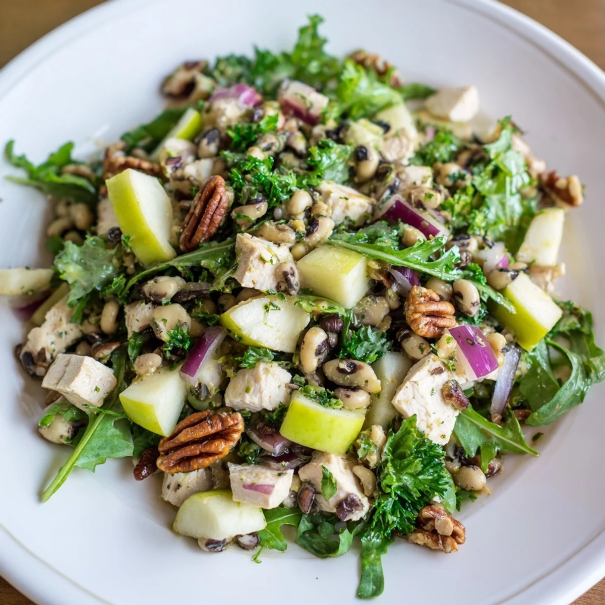 Chicken and Apple New Years Luck Salad, bursting with colorful ingredients, ready to enjoy.
