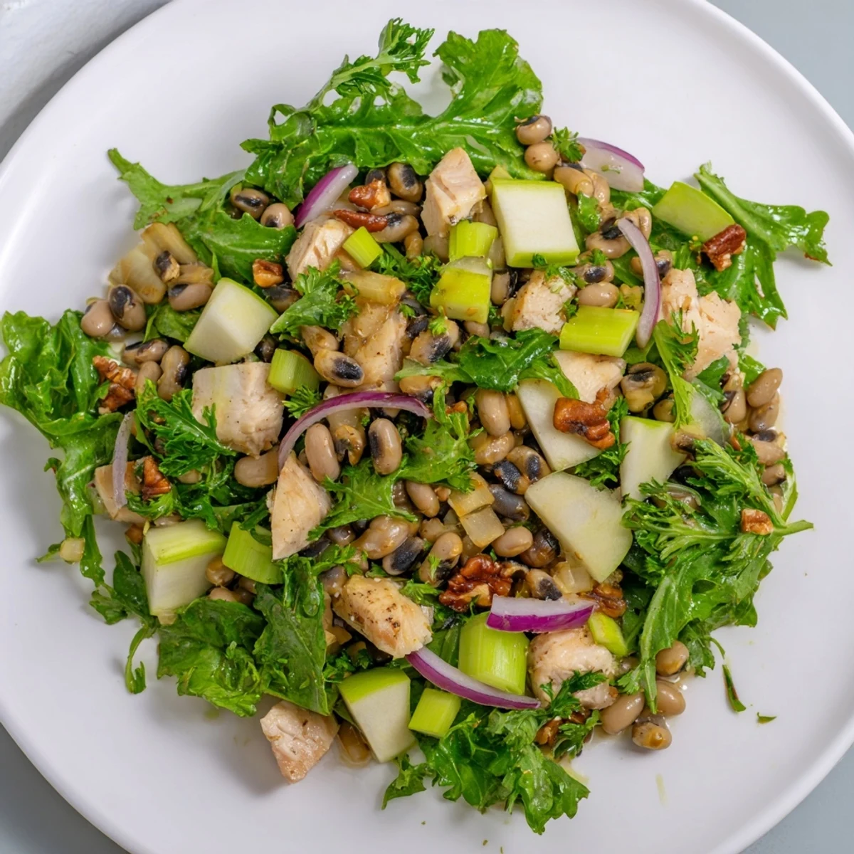 Tender chicken, crisp apples, and black-eyed peas make this delicious Chicken and Apple New Years Luck Salad.