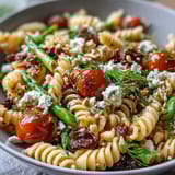 Vibrant Lemon Vinaigrette Pasta Salad with Cucumbers and Cherry Tomatoes, perfect for summer picnics.  