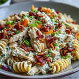 Hearty Creamy Chicken Bacon Ranch Pasta Salad perfect for outdoor summer parties.