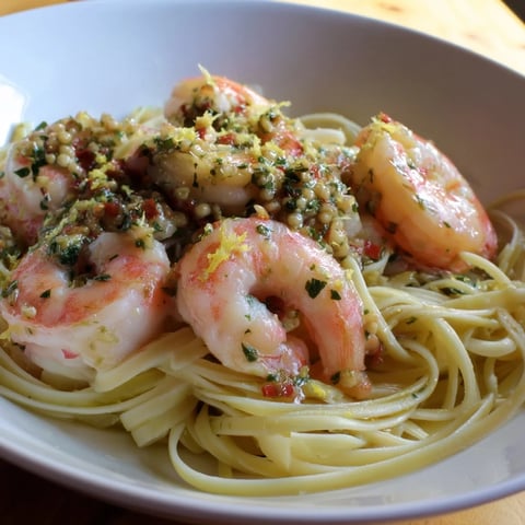 Tossed Lemon Herb Pasta with Shrimp, a light and bright Italian-inspired dish, ready to eat.