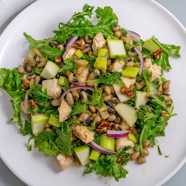 Tender chicken, crisp apples, and black-eyed peas make this delicious Chicken and Apple New Years Luck Salad.