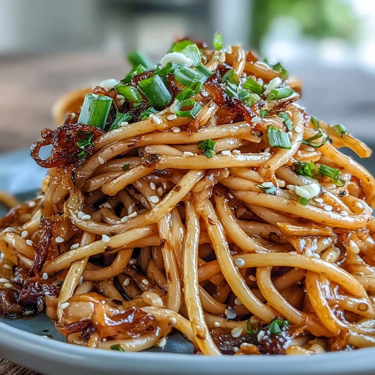 Savory Gochujang Butter Pasta topped with fresh green onions.